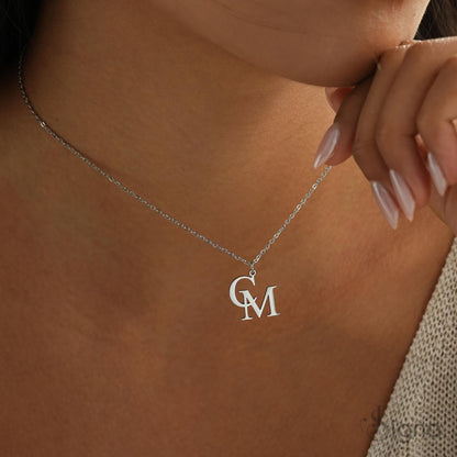 Delicate minimal initial necklace on model