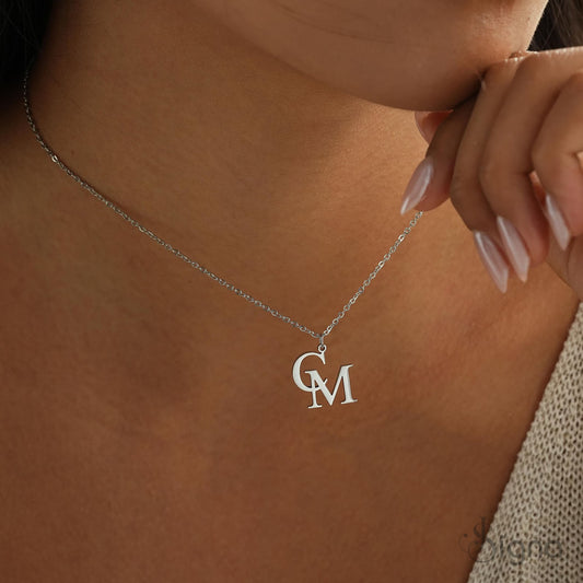 Delicate minimal initial necklace on model
