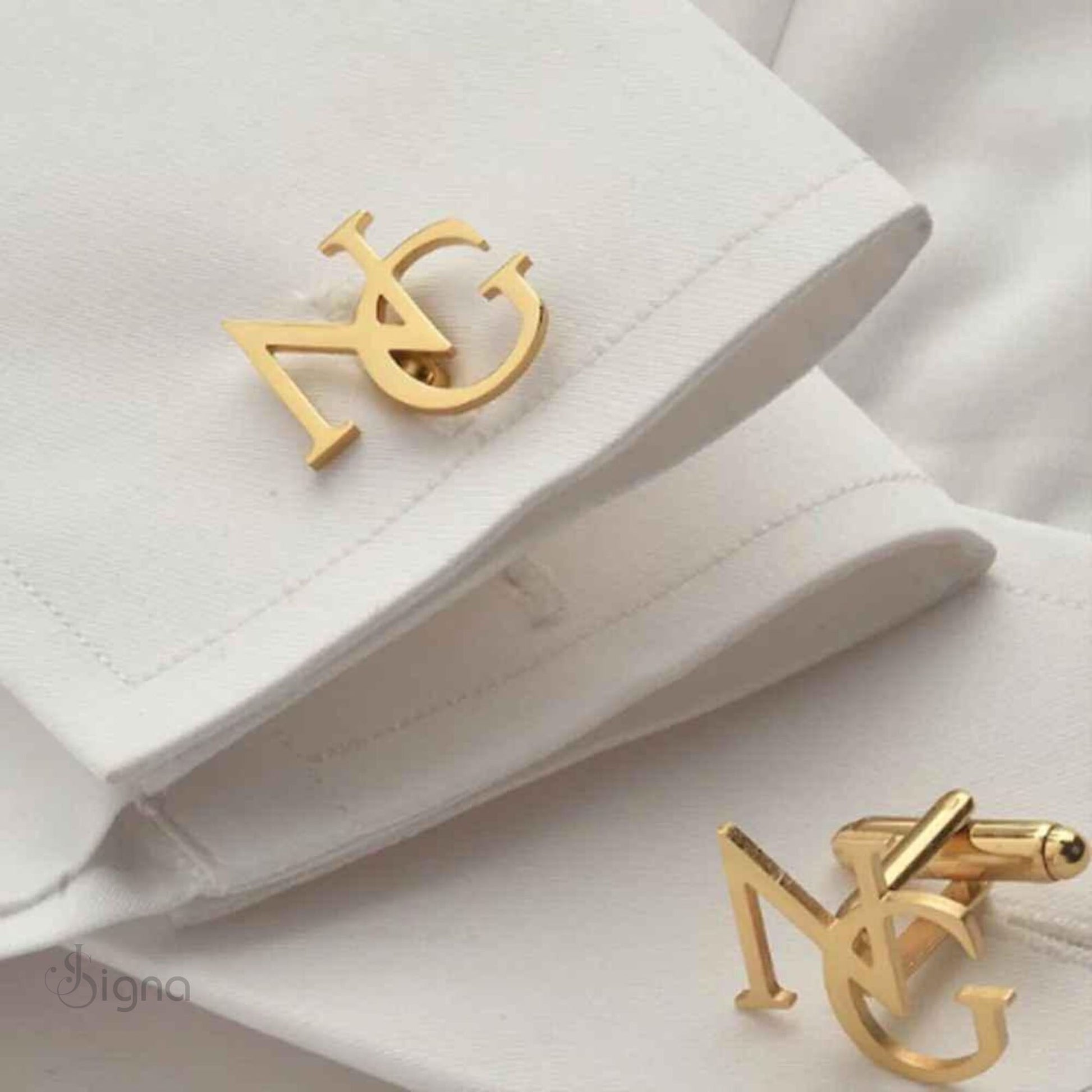 Signa Elite Initial Cufflinks for men in polished silver, featuring a bold precision-cut letter 'A' on a French cuff shirt.