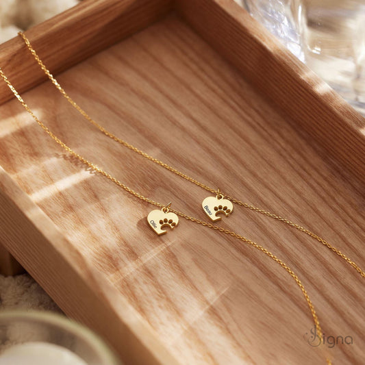 Gold personalized pet paw heart necklace with engraved pet name pendant
