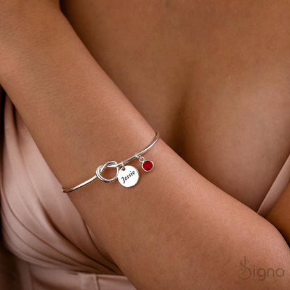 Custom name and birthstone gold tie-knot bangle bracelet for women